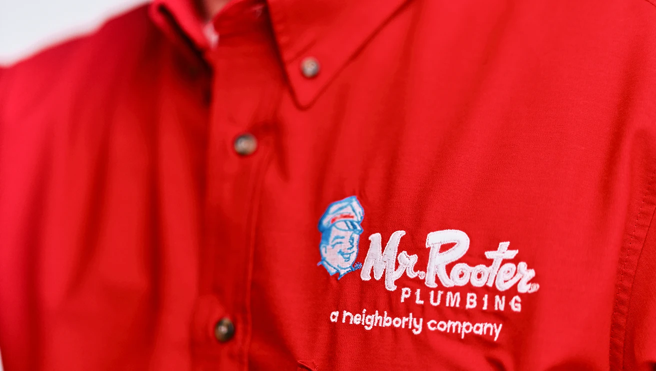 Close up of a Mr. Rooter work shirt.