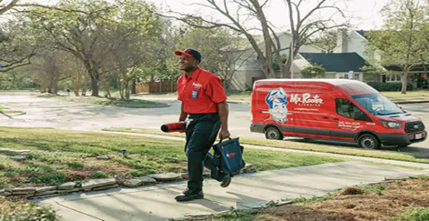 Mr. Rooter plumber arriving to assist a customer.