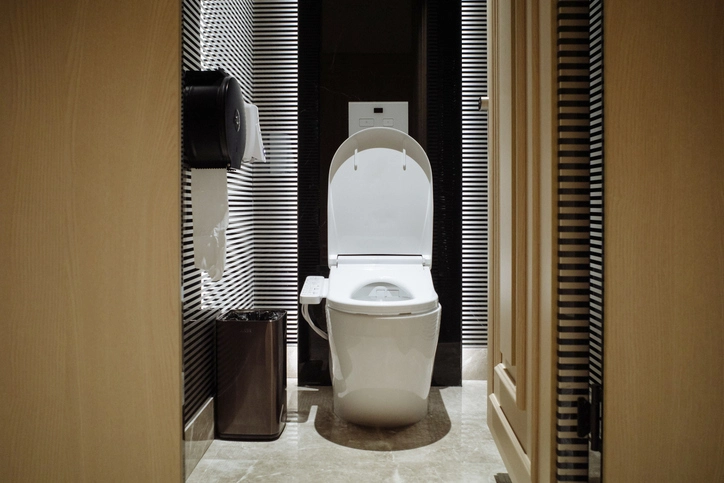 Motion sensor toilet in public restroom | Mr. Rooter Plumbing of South Jersey