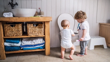 little kids near toilet