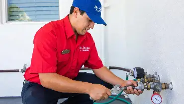 Mr. Rooter professional preventing a plumbing emergency.